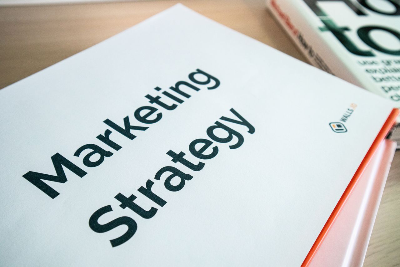 services-04 Close-up of a marketing strategy document on a desk, ideal for business content.